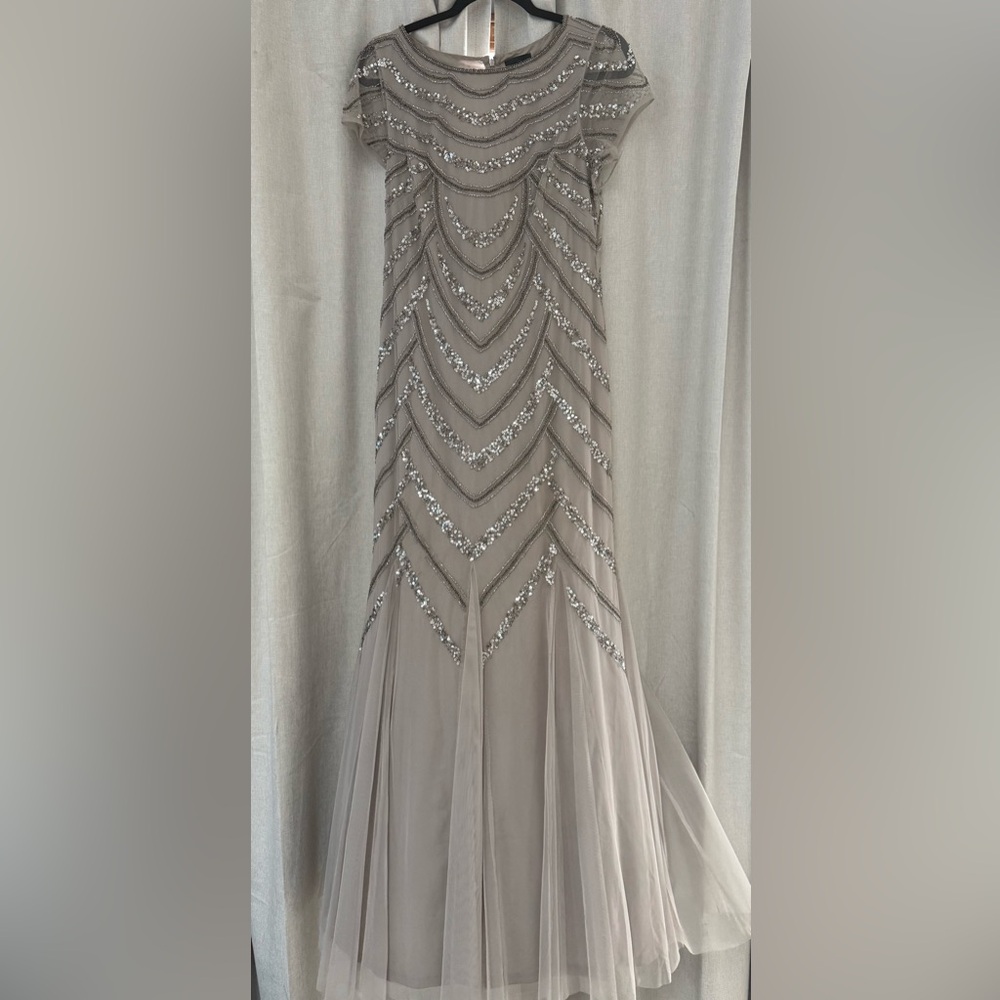 Beautiful Adrianna Pappell gown.